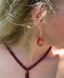 Buddha orange teardrop chakra earrings